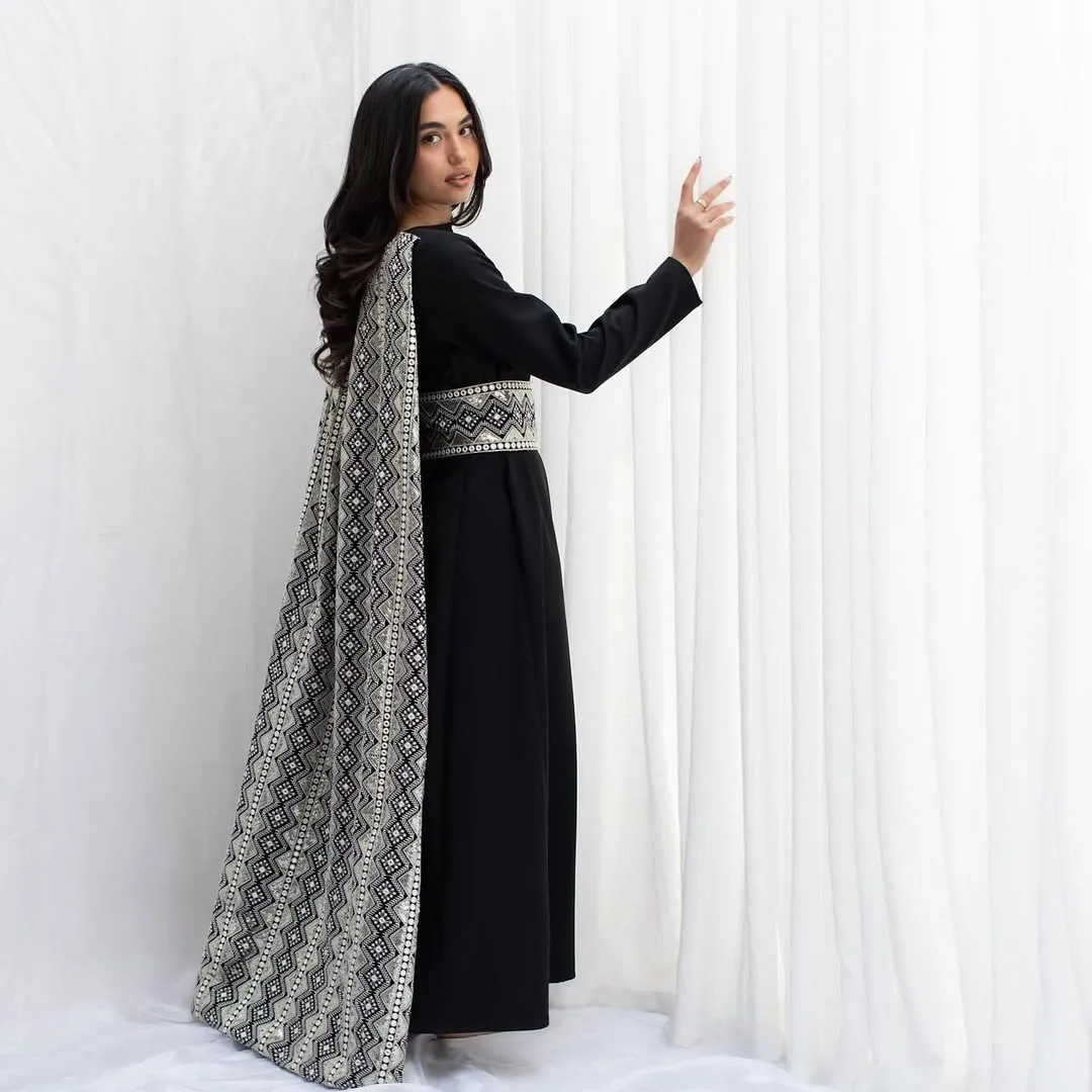 Black version from the back, with the embroidered panel falling to the floor